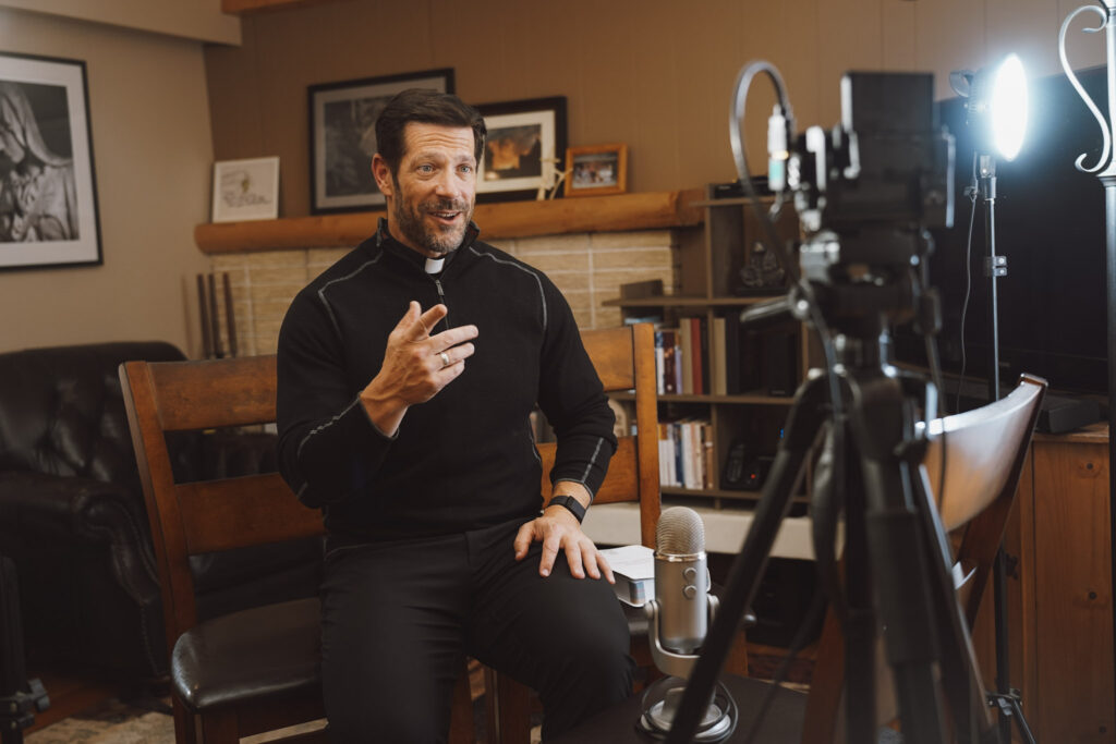 The Associated Press: New Father Mike Schmitz Podcast Charts in Top 3 of All New Apple Podcasts